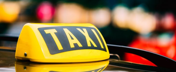 Taxi Sign On Roof Of Car
